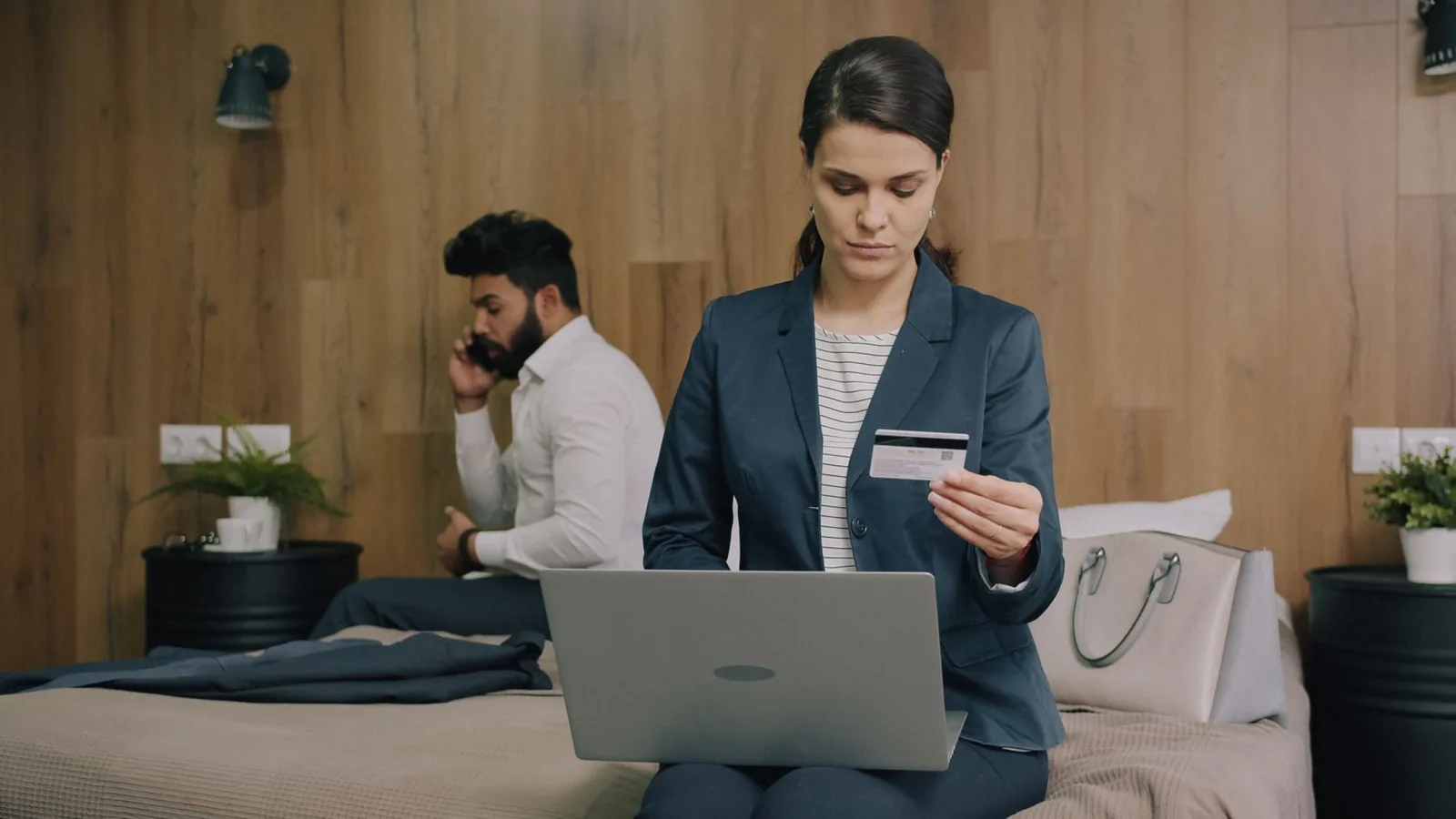 Traveler choosing the best hotel credit cards for rewards while booking a trip