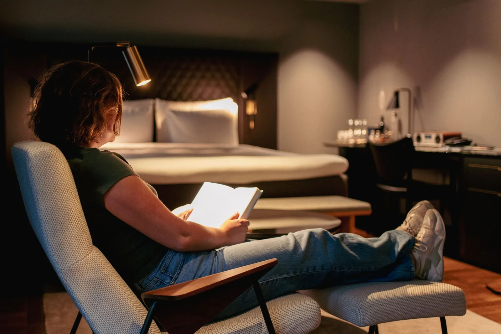 guest comparing hotel prices on a phone before booking