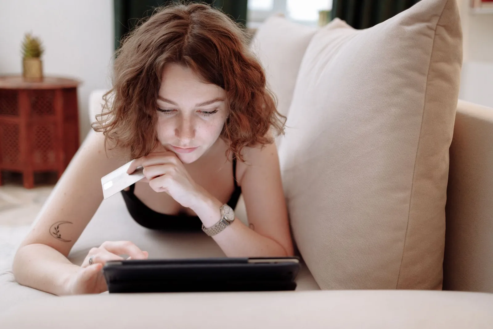 A hotel loyalty member checking credit card reward options for free nights