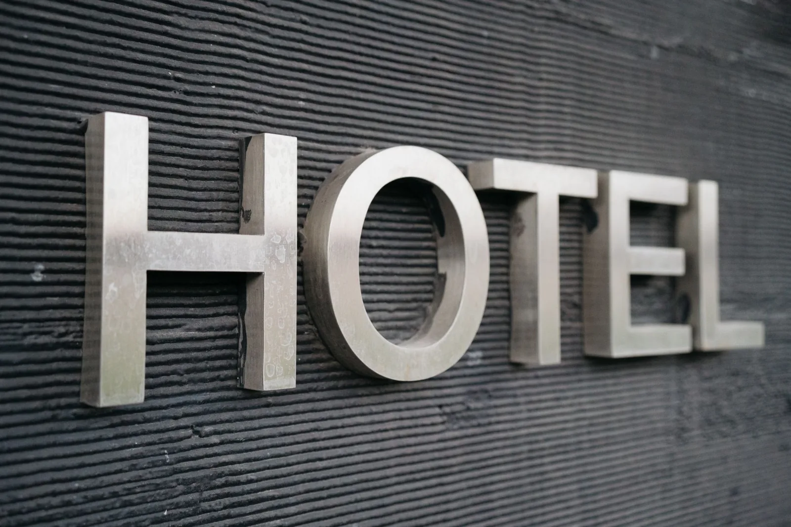 Person redeeming hotel points for a free night on a phone